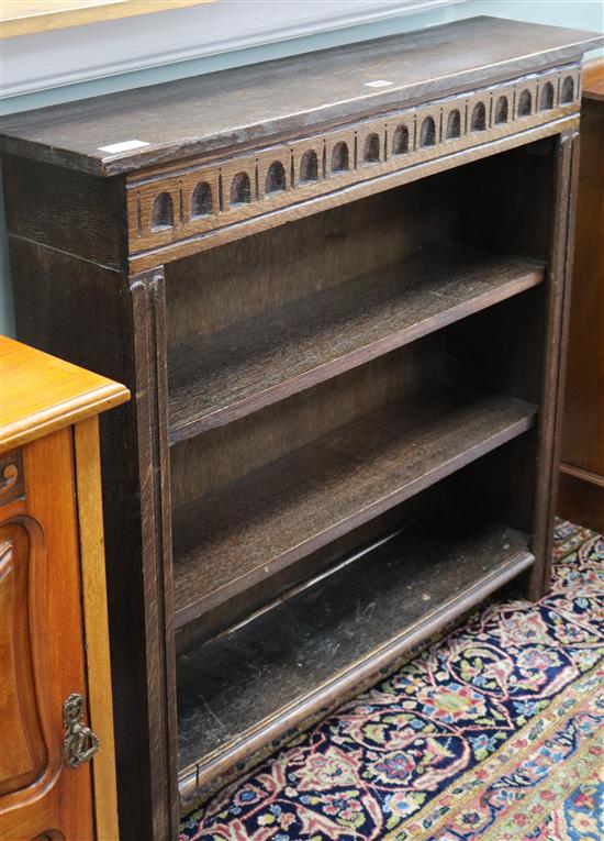 A small oak carved bookcase W.99cm